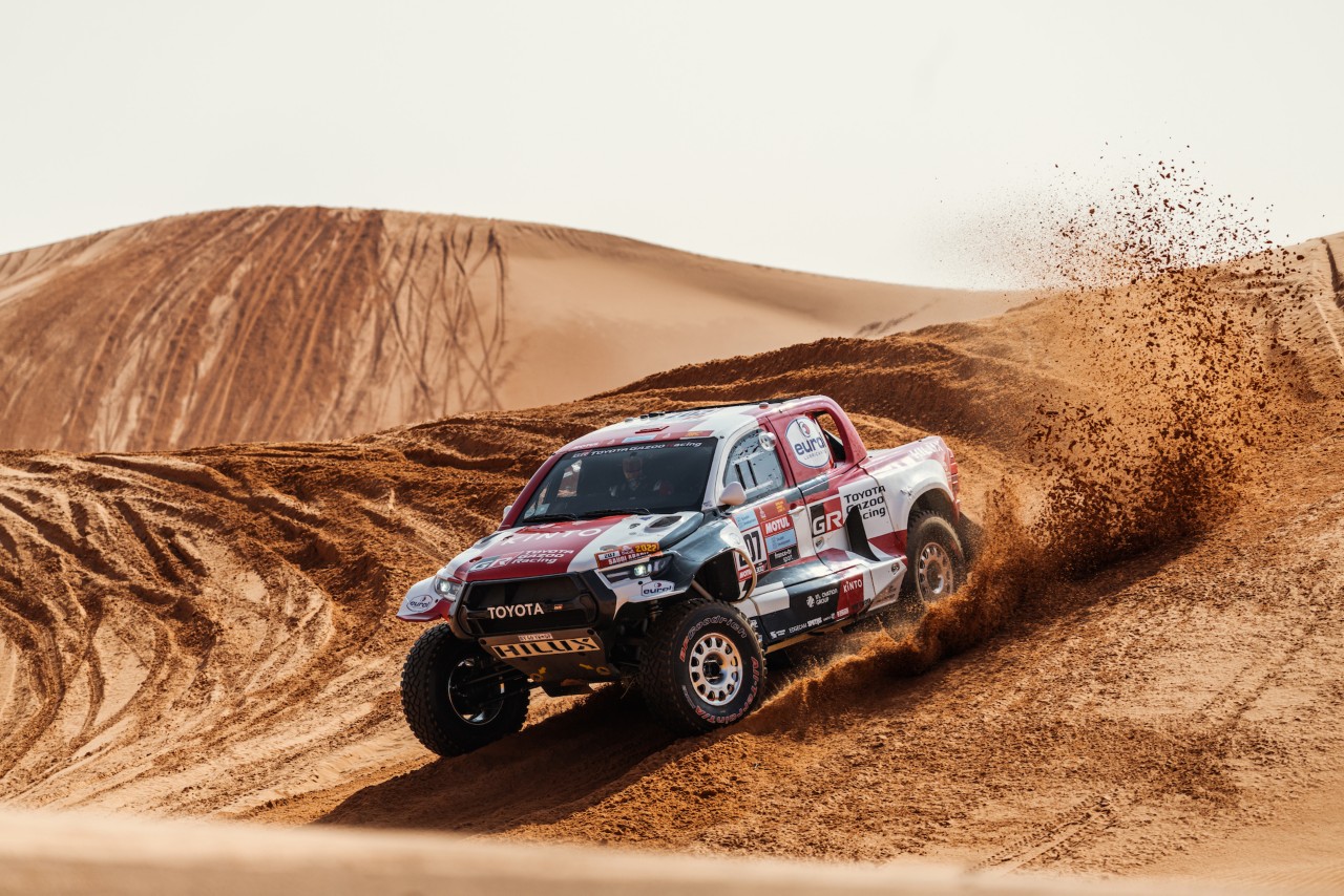 Rally car drifting in the desert